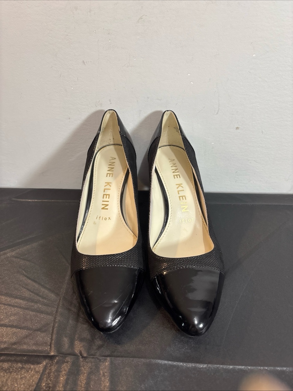 Anne Klein Black Pointed Cap-Toe Pumps. 10/6